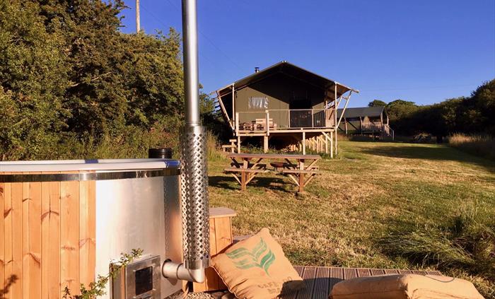All lodges have private wood fired hot tub